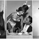 Famed entertainer Josephine Baker; a Playboy Club cocktail waitress getting her cuff signed by singer Jackie Wilson; entertainer Joyce Bryant. All are wearing garments designed by Zelda Wynn Valdes.